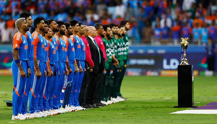 Pakistani and Indian players are in line for their national folk songs on their Asia Cup 2025 match in the VAE, Dubai on September 14, 2025. - Reuters