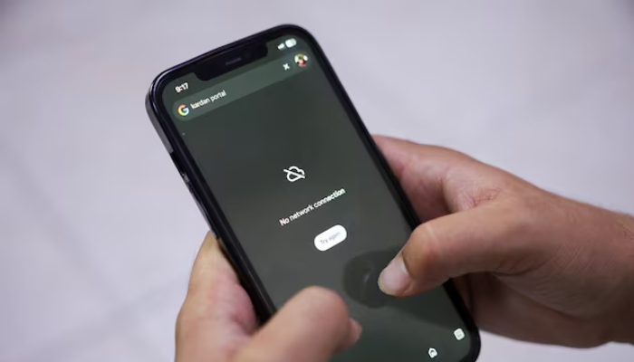 A man tries to use Google on his smartphone amid total telecom shutdown across the country, in Kabul, Afghanistan, September 30, 2025. — Reuters