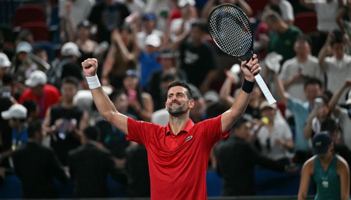 Djokovic breaks Federer record at Shanghai Masters after battling illness