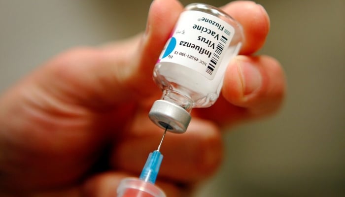 A nurse prepares an injection of the influenza vaccine at Massachusetts General Hospital in Boston, Massachusetts, January 10, 2013. — Reuters