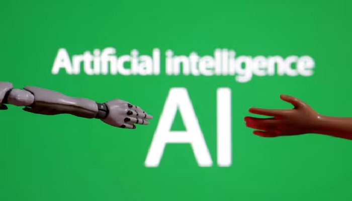 Words reading Artificial intelligence AI, miniature of robot and toy hand are pictured in this illustration taken December 14, 2023. — Reuters