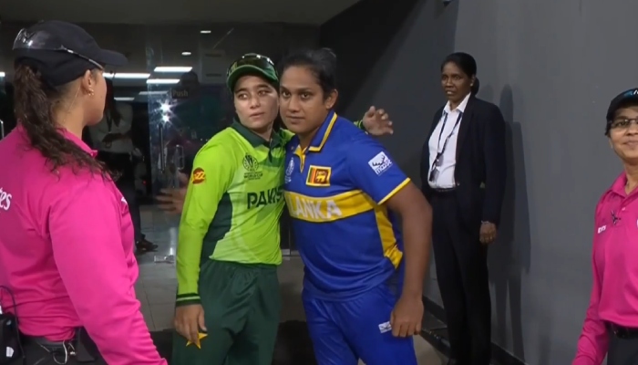 Pakistans Fatima Sana and Sri Lankas Chamari Athapaththu embrace after their game is called off due to rain at the R Premadasa Stadium, Colombo, October 24, 2025. — ICC