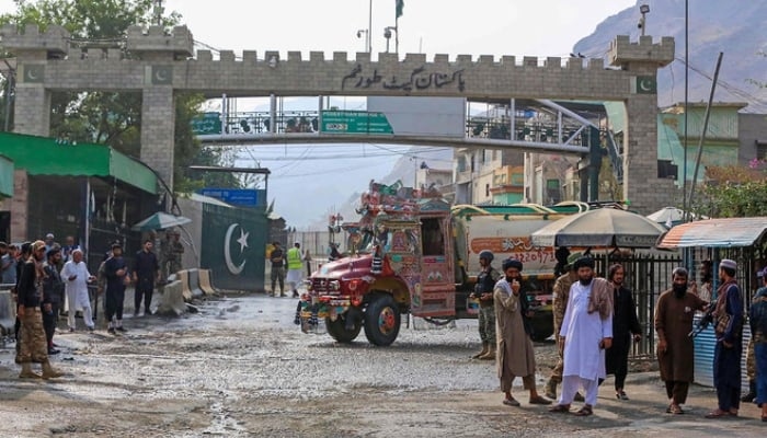 Security personnel stand guard at the Pakistan-Afghanistan border in Torkham. — AFP/File