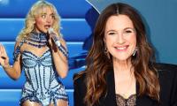 Sabrina Carpenter ‘arrests’ Drew Barrymore dressed as ghost face