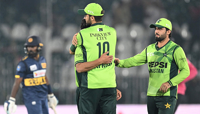 Pakistans captain Shaheen Shah Afridi (C) celebrates with teammates after the dismissal of Sri Lankas Janith Liyanage (L) during the first one-day international (ODI) cricket match between Pakistan and Sri Lanka at the Rawalpindi Cricket Stadium on November 11, 2025. — AFP