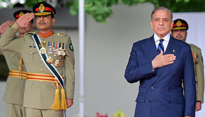 Prime Minister Shehbaz Sharif (right) and COAS Field Marshal Asim Munir review a passing out parade at the Pakistan Military Academy (PMA) Kakul, in Abbottabad on April 26, 2025. — AFP