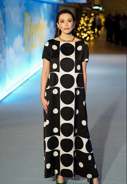 Elizabeth Olsen steals spotlight at ‘Eternity’ premiere