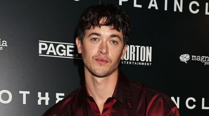 Tom Blyth shares his two cents on the importance of rom coms