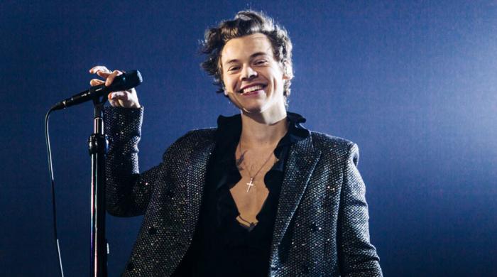 Harry Styles unveils new album after cryptic posters spark fan frenzy
