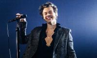 Harry Styles unveils new album after cryptic posters spark fan frenzy