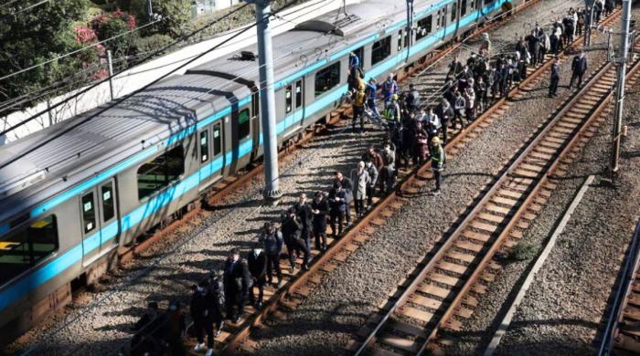 Fire causes power outage on Tokyo train lines, thousands stranded as ‘operations halted’