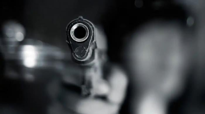 Stranger knocks, then opens fire on Indiana judge and wife