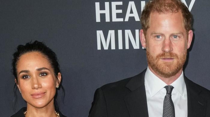 Meghan Markle torn between standing by Prince Harry and facing intense scrutiny