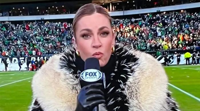 Erin Andrews's fur coat takes centre stage during Seahawks vs Rams game