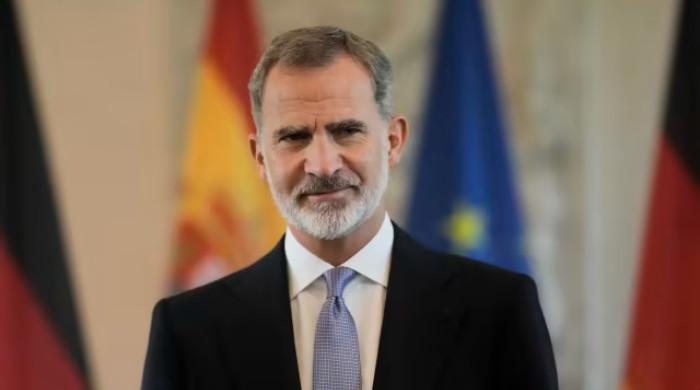 King Felipe hosts centennial moment behind palace doors