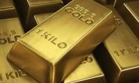 Gold price climbs to record high amid global uncertainty