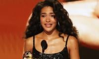 Olivia Dean fights back tears after winning first Grammy Award