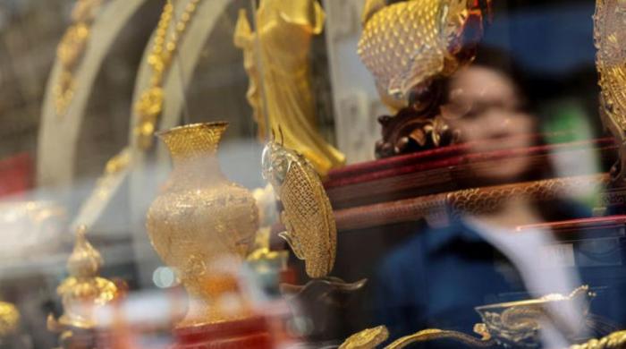 Gold bounces back after heavy losses, set for biggest daily rise since 2008