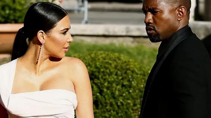 Kim Kardashian fears to poke 'bear' Kanye West amid new romance  