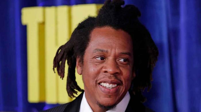 Photo of Jay-Z, other prominent figures with Jeffrey Epstein proven to be fake 