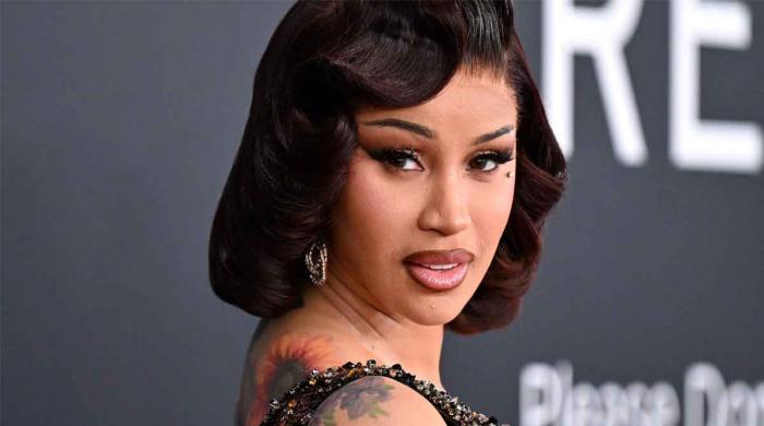 Cardi B compares her fall to government at Las Vegas show