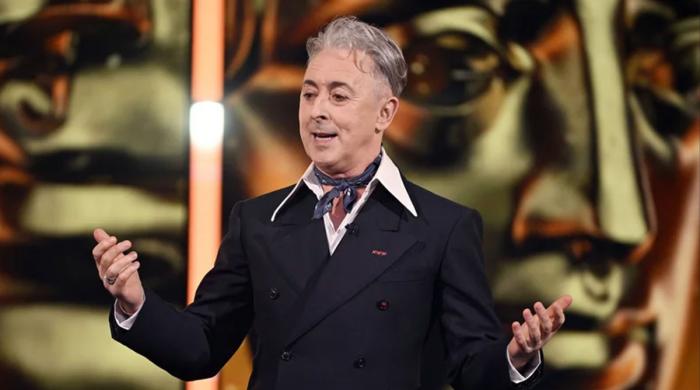 Host Alan Cumming thanks BAFTAs audience for patience after Tourette’s disturbance