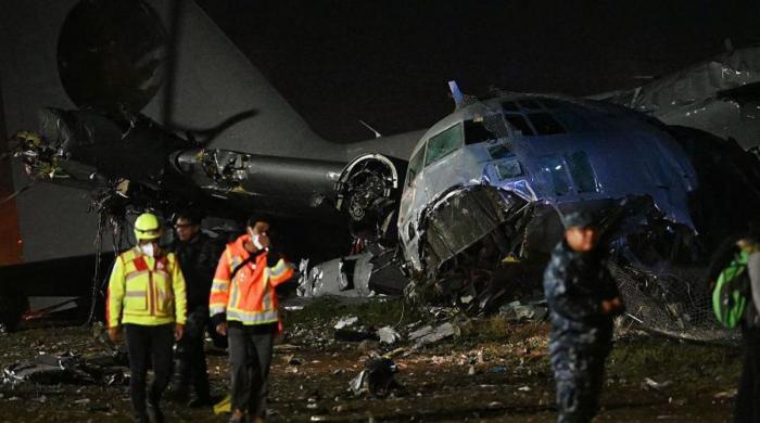 At least 15 dead after military plane carrying new banknotes plunges out of control in Bolivia 