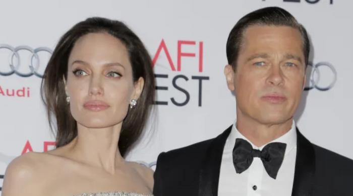 Brad Pitt feeling down in the dumps after kids' snubs as pals continue to paint Angelina Jolie a villain