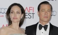 Brad Pitt feeling down in the dumps after kids' snubs as pals continue to paint Angelina Jolie a villain