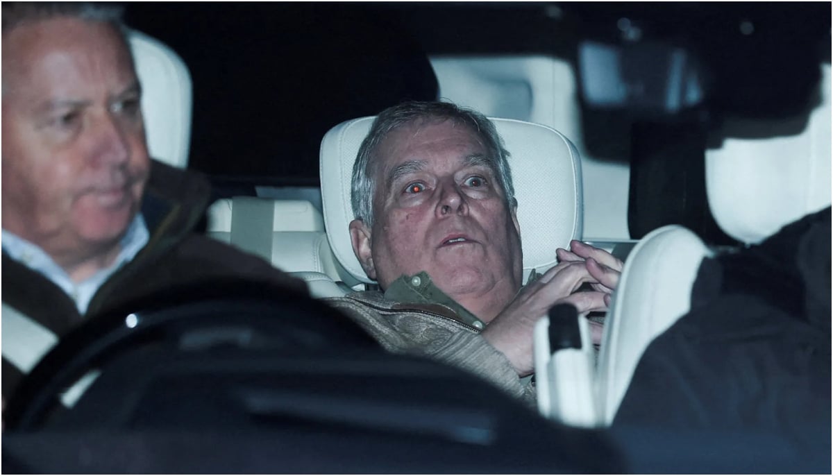 Andrew during arrest/ Reuters/Phil Noble