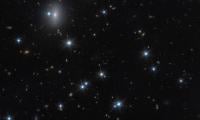 Astronomers Spot Nearly Invisible Galaxy Packed With Dark Matter