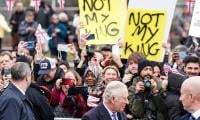 King Charles walks by as protestors cry: 'What did you know about Andrew?'  