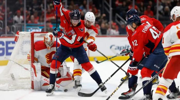 Washington Capitals rout Calgary Flames 7-3 behind Connor McMichael's two goals