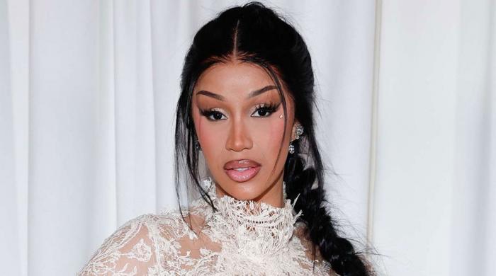 Cardi B says 'sorry' after unexpected concert moment with fan