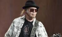 Neil Young teases new music amid ‘sad and depressing times’