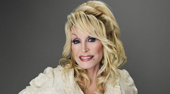 Dolly Parton reveals why she stepped back from touring: 'I ain't near done'