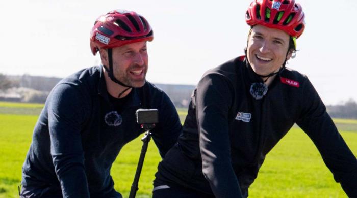 Prince William offers royal support to Greg James on tandem bike
