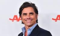 John Stamos debuts first tattoo at 62 in new career chapter