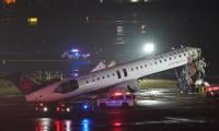 Two pilots dead after Air Canada plane crashes into fire truck at LaGuardia Airport 