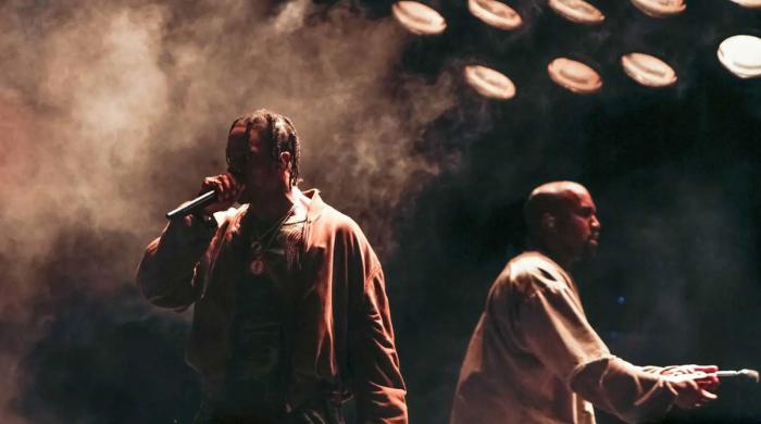 Kanye West and Travis Scott pull power pose in new pure-attitude photo  