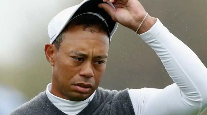 Tiger Woods die-hard fans rock controversial T-shirts after golf legend's arrest  