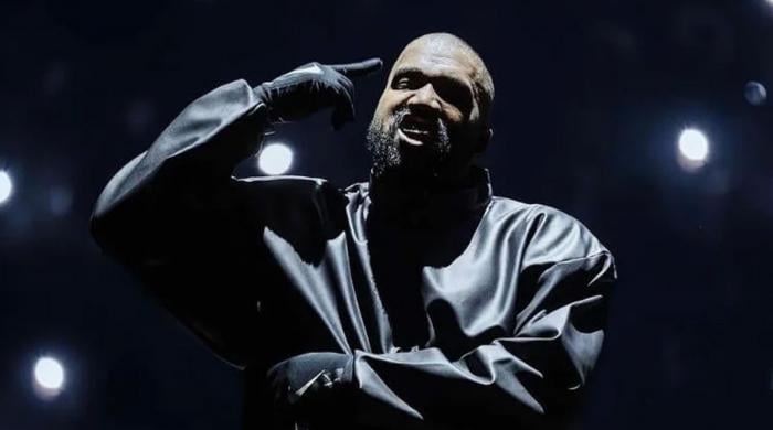 Kanye West hit with wild warnings by mystery man as video explodes on April Fool's Day 