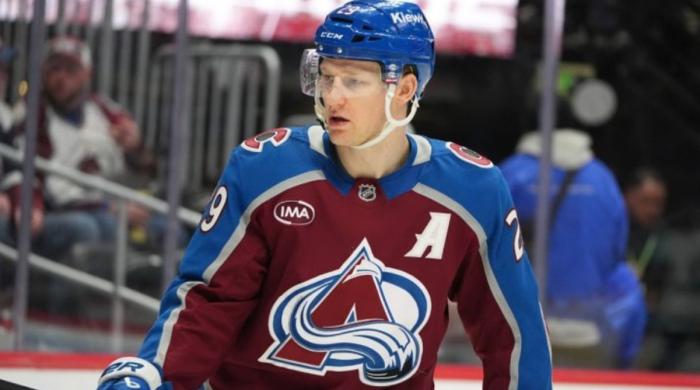 Avalanche star Nathan MacKinnon reaches 50 goals milestone as Canucks win thriller