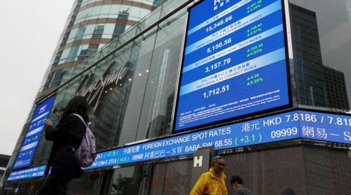 Asian stocks slide as oil prices surge amid Middle East ceasefire uncertainty