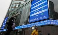 Asian stocks slide as oil prices surge amid Middle East ceasefire uncertainty