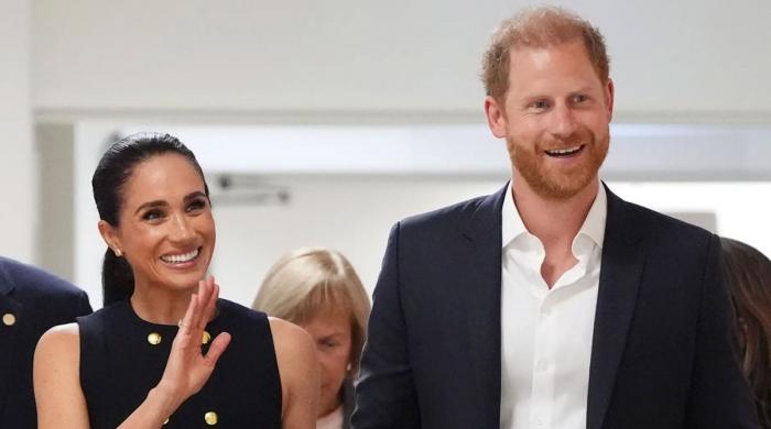 Prince Harry, Meghan Markle begin Australia visit with little public buzz