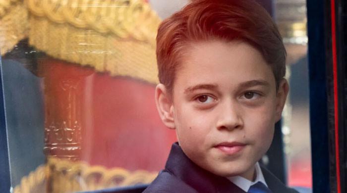 Prince George hesitates in front of royal super fans