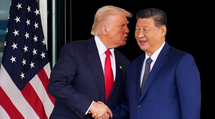 Trump hails 'fantastic trade deals' after private meeting with Xi in Beijing
