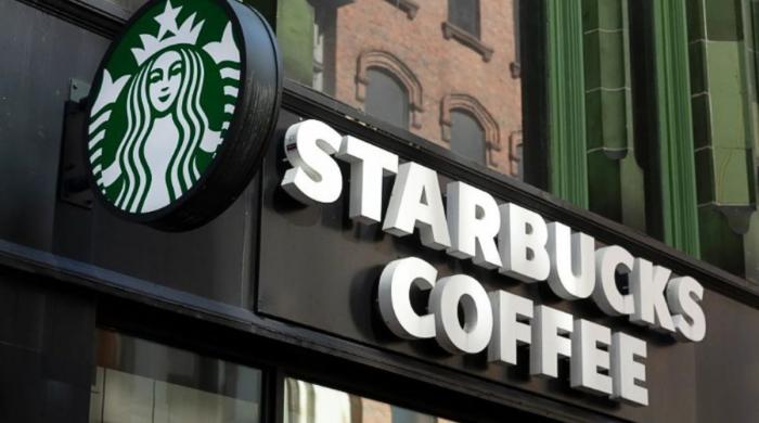 Starbucks initiates hundreds of layoffs as it closes some regional US offices