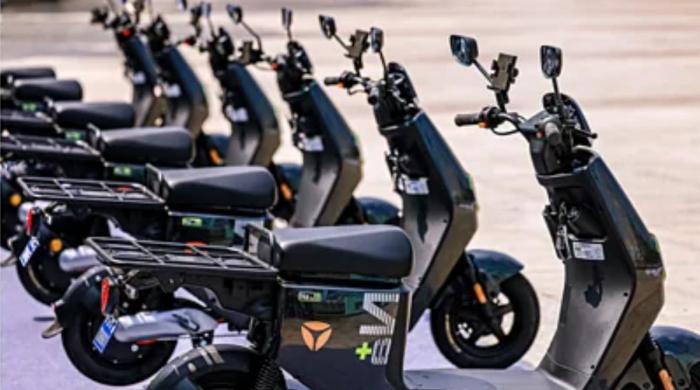 China tests self-driving scooters that park, ride themselves
